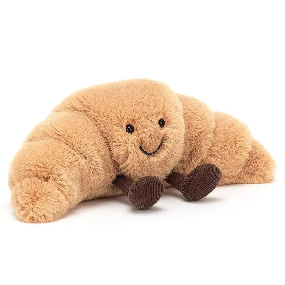 Cojín Peluche Croissant 33 cm – Suave, marrón claro, con carita sonriente