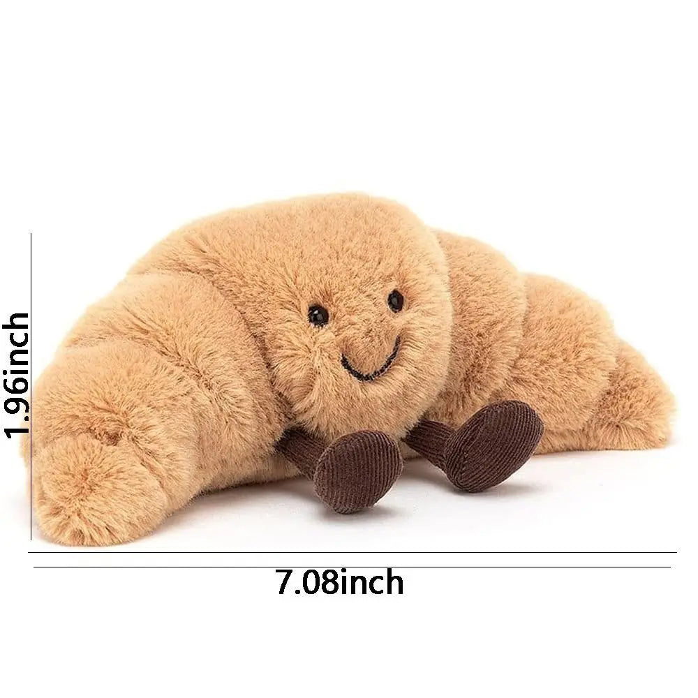 Cojín Peluche Croissant 33 cm – Suave, marrón claro, con carita sonriente