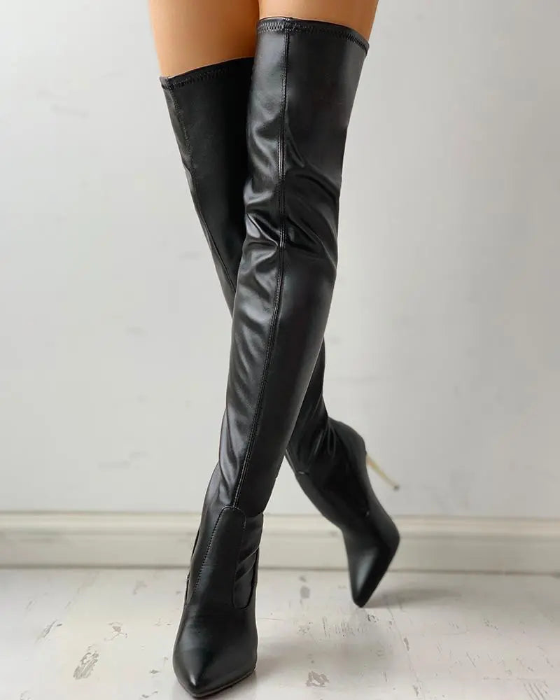 Botas altas de mujer con cremallera y tacón bajo