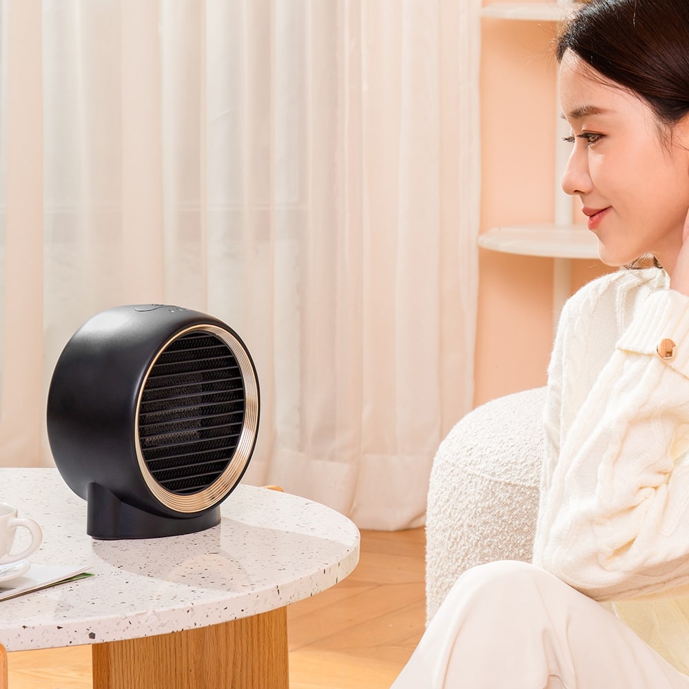 Calefactor de escritorio compacto con elemento cerámico PTC y doble velocidad de ventilador