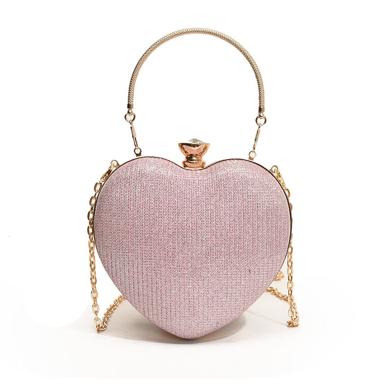Clutch de noche glamuroso con forma de corazón