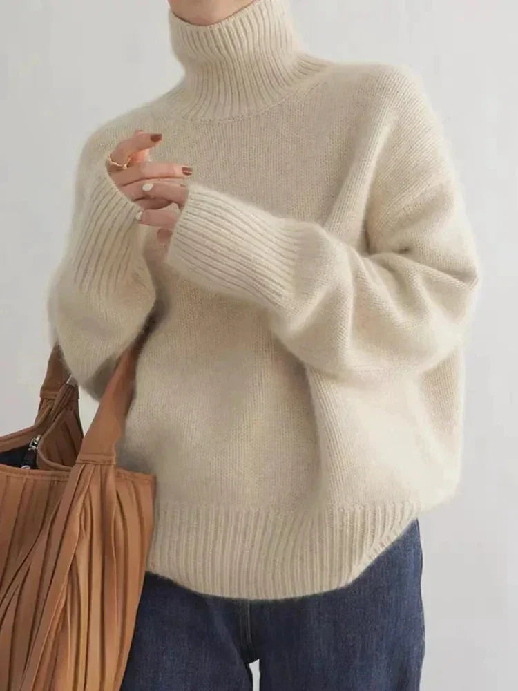 Jersey de punto acanalado con cuello alto para mujer