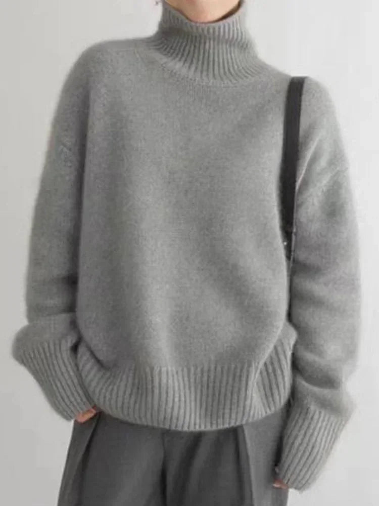 Jersey de punto acanalado con cuello alto para mujer
