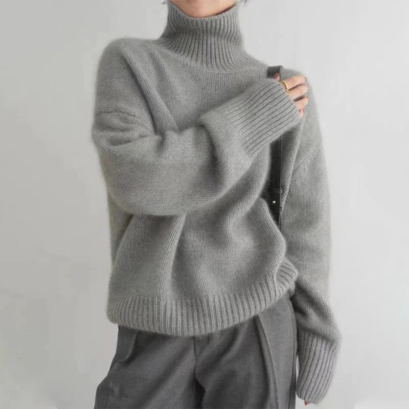 Jersey de punto acanalado con cuello alto para mujer
