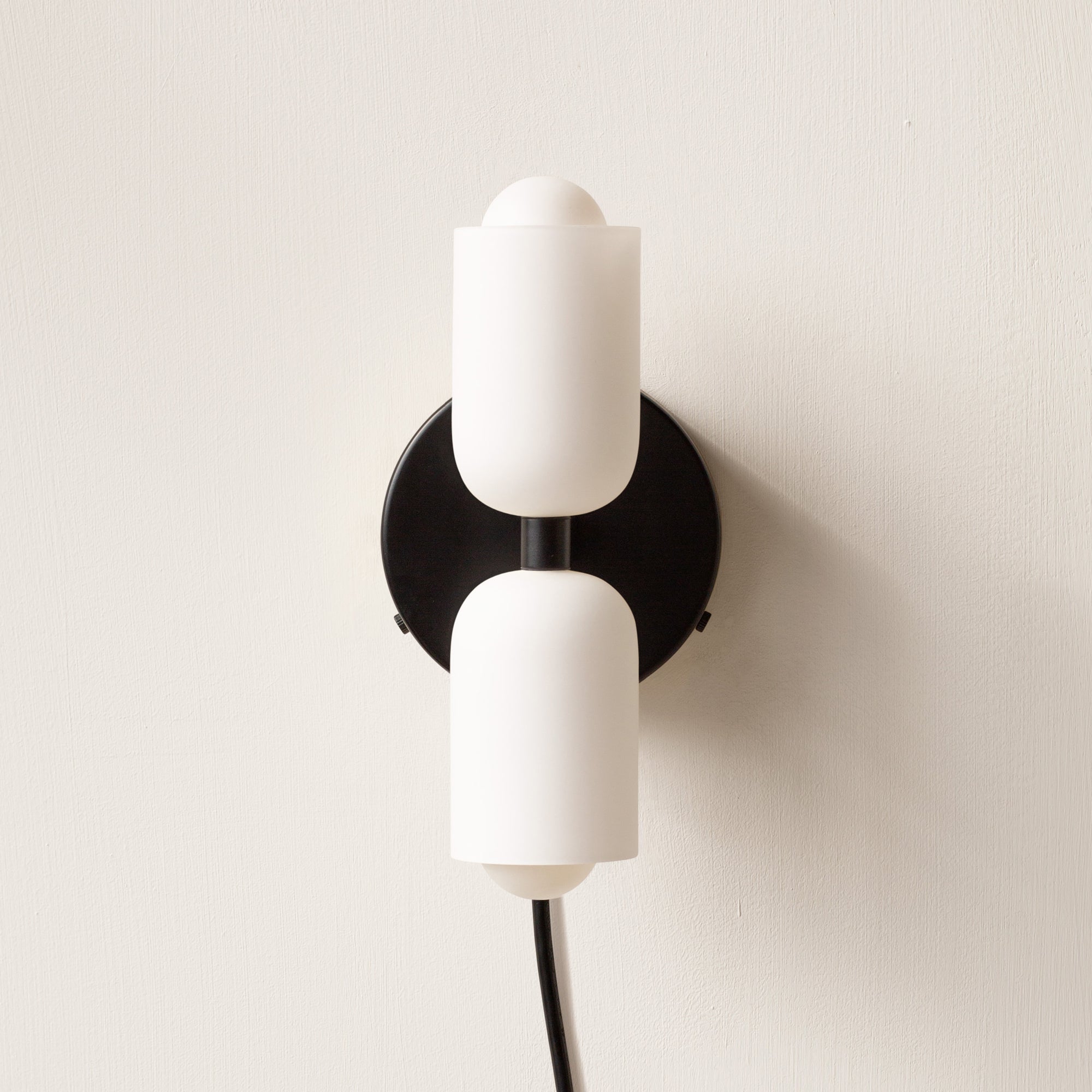 Lámpara de pared elegante con luz hacia arriba y abajo