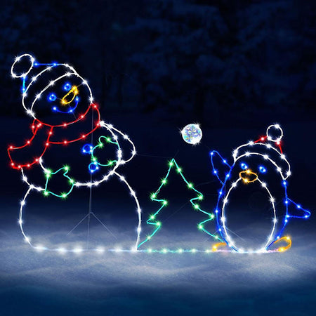 Luz LED animada de batalla de bolas de nieve con muñeco de nieve y pingüino
