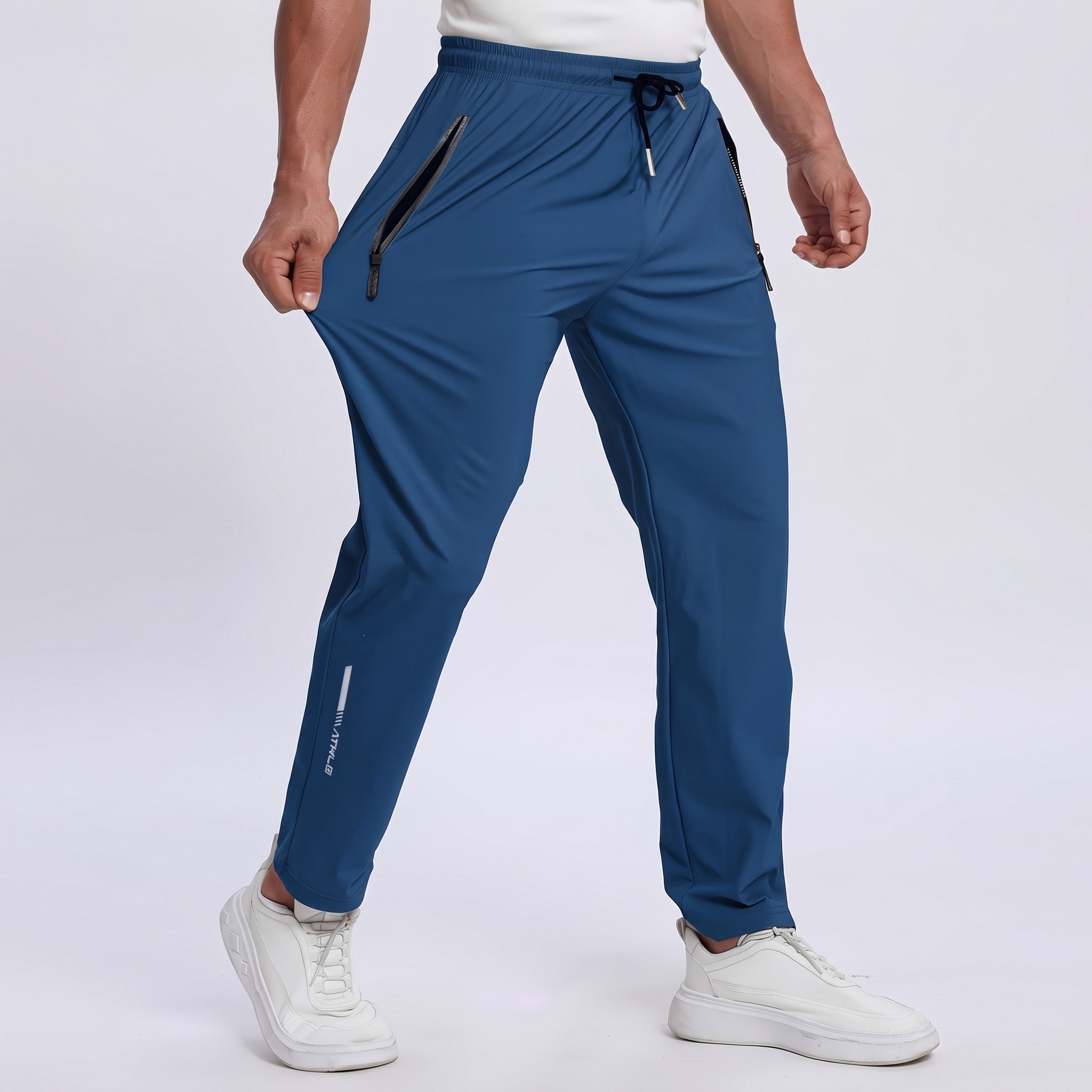 Pantalones deportivos transpirables para hombre con detalles reflectantes y cordón ajustable