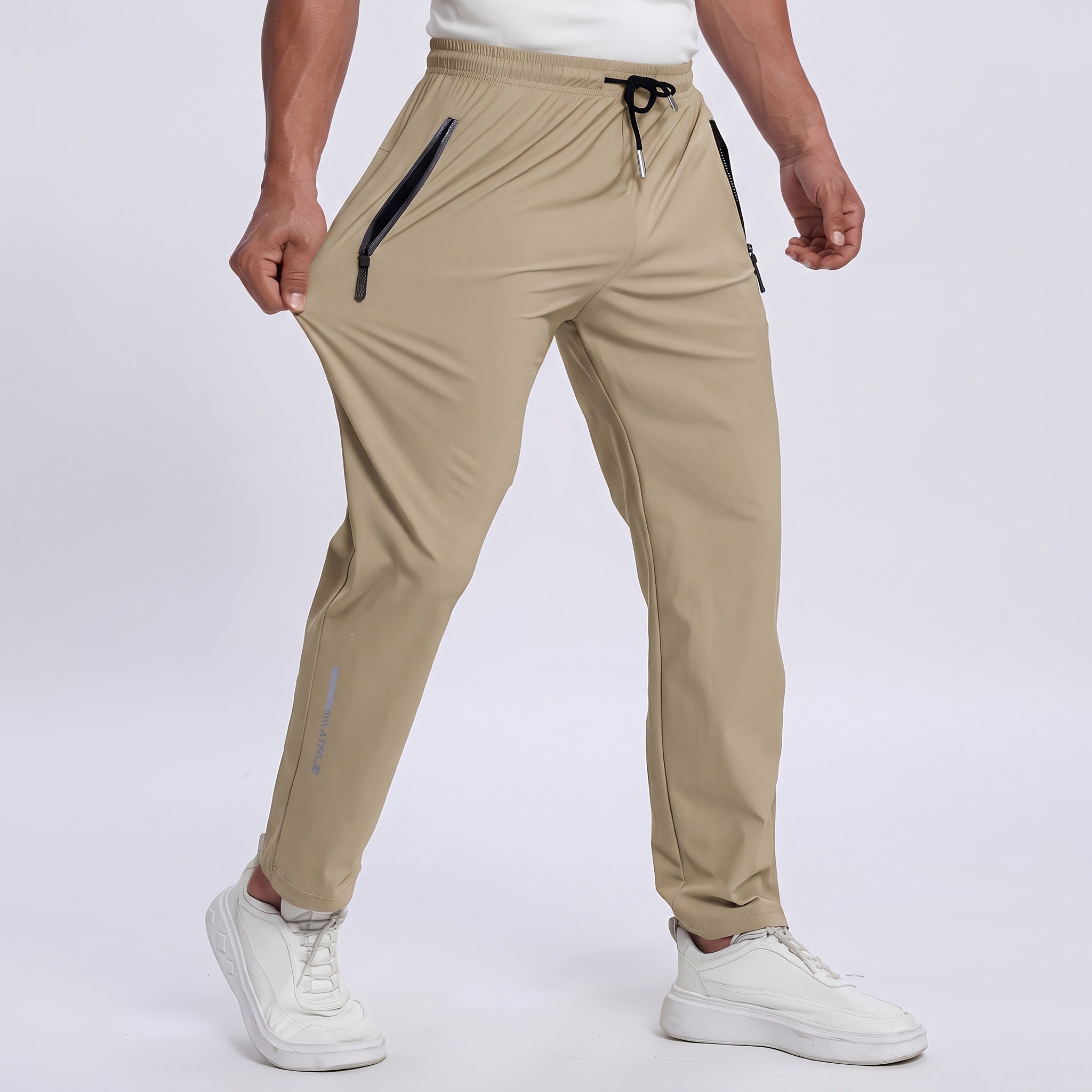 Pantalones deportivos transpirables para hombre con detalles reflectantes y cordón ajustable
