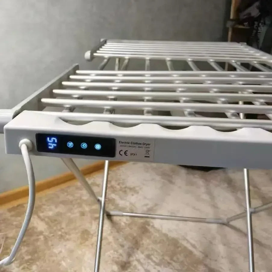 Tendedero eléctrico plegable con barras calefactables de bajo consumo para interior
