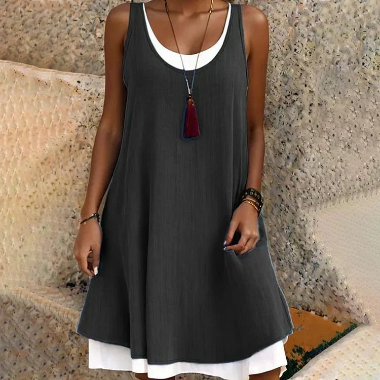Vestido mini de mujer con efecto superpuesto: estilo elegante sin mangas y cuello redondo