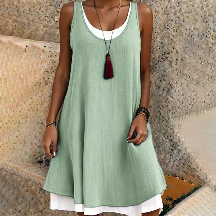 Vestido mini de mujer con efecto superpuesto: estilo elegante sin mangas y cuello redondo