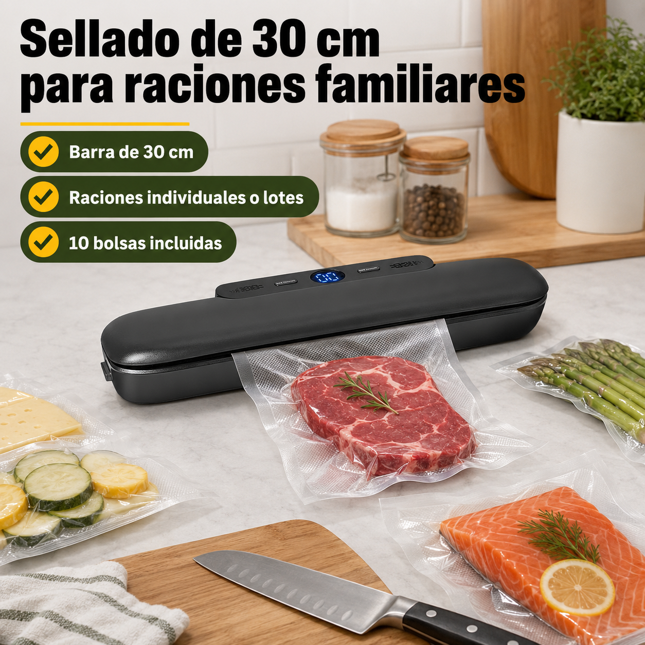 Envasadora al vacío junto a alimentos envasados mostrando el tamaño de sellado de 30 centímetros