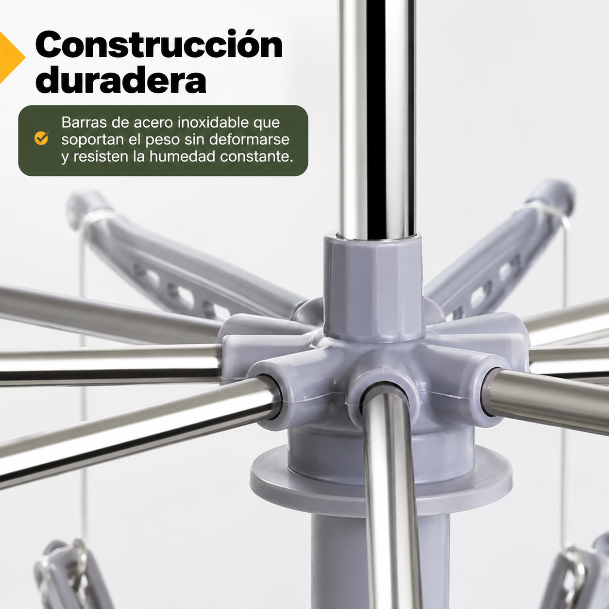 Detalle de la construcción en acero inoxidable del tendedero eléctrico con conexión de alimentación