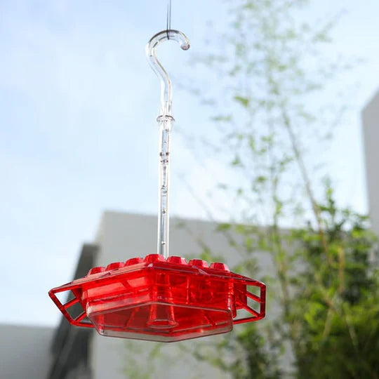 Alimentador para colibrí a prueba de hormigas para uso exterior con posadero colgante